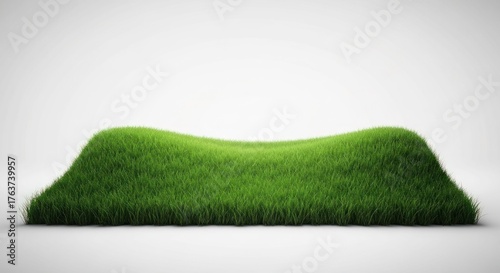 Grassy mound on white. Artificial lawn surface. Centered composition