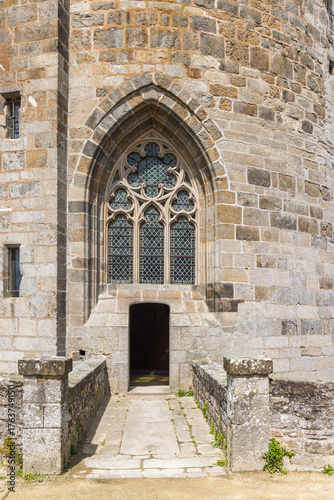 Dinan castle entrance with gothic style window in Dinan in Cotes-d'Armor, Brittany, France