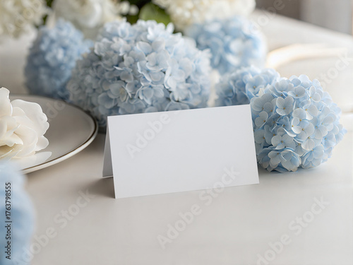 Принти на полотні Blue Hydrangea Wedding Place Card Mockup – Elegant Tent Card on White Table with