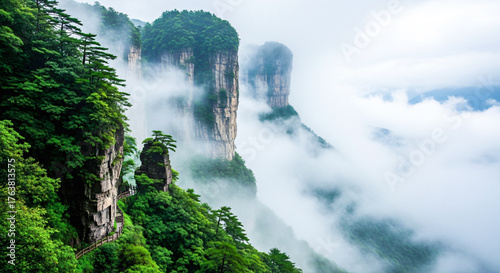 Misty vertical rock pillars and lush green forest in the beautiful landscape of Zhangjiajie China