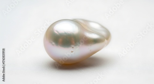 Vector illustration of a single, lustrous baroque pearl with iridescent overtones, isolated on a white background