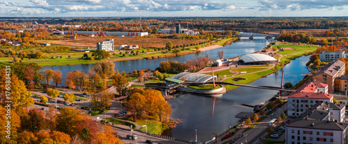 Tableau sur toile Aerial view of Jelgava, Latvia, as Lielupe and Driksa curve by islands, a pedest