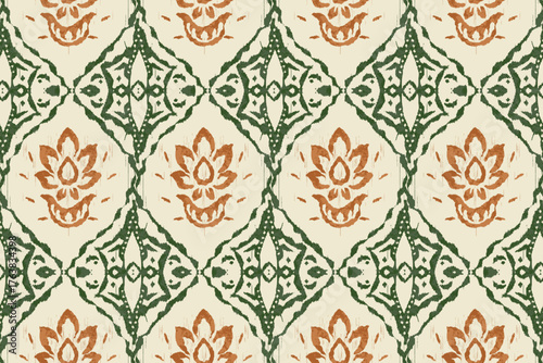 Traditional kat Floral Diamond Seamless Pattern in green and stylized floral motifs. textile-style print evokes bohemian, ethnic, Indian, or Southeast Asian aesthetics. It's ideal for use in fabric.