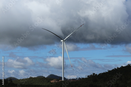 Wind Turbine Generator on the Mountain Under Dark Cloud