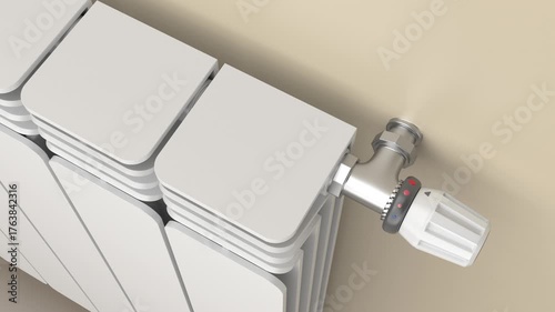 Regulating the temperature of a heating radiator by rotating the valve, close up