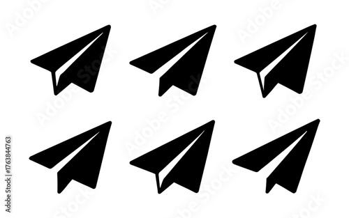 Set of minimalist black paper plane icons on white background