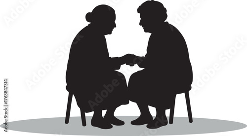 Silhouette of Two Elderly Women Sharing Emotional Moment Friendship Symbol