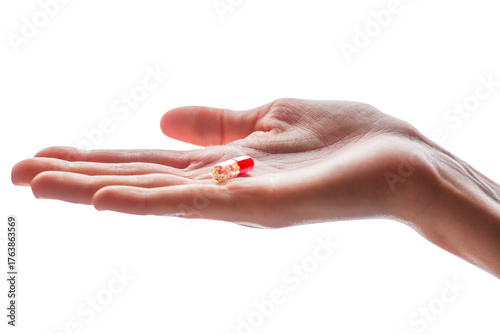 one tablet in the capsule on the female palm