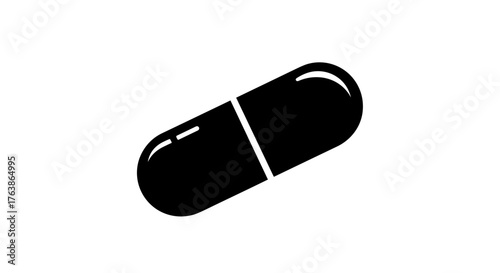 Black capsule medicine pill isolated on white background.