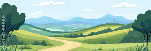 Winding dirt road through green grassy meadows with trees and rolling hills in valley landscape with distant mountains under blue sky