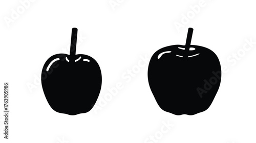 Two glossy red candy apples with stems on a white surface minimalist artistic design fruit