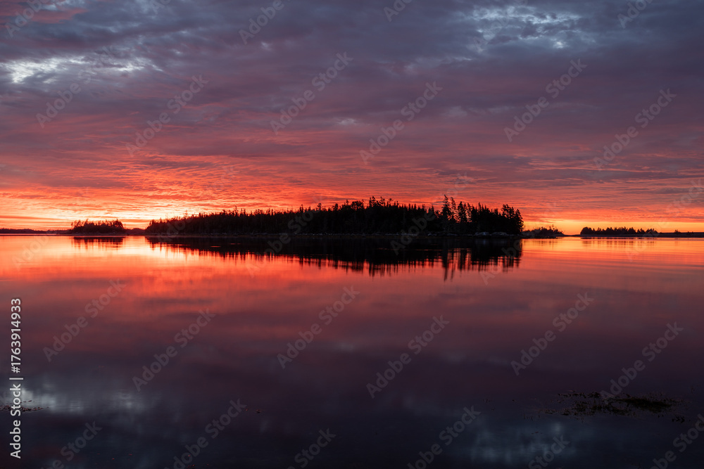Fototapeta premium View of the Atlantic Ocean at sunrise at Moser River, an hour's drive from Halifax. Nova Scotia captivates visitors with its beautiful nature and landscape.