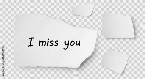 Torn paper pieces with handwritten message expressing longing and missing someone