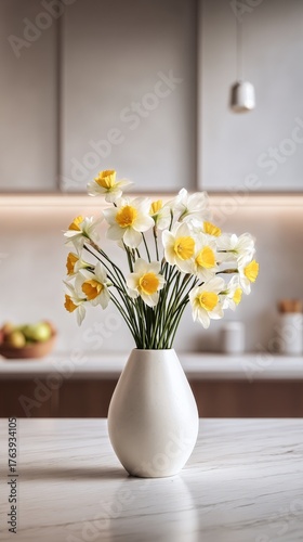 Fresh Daffodils Arranged in a Modern Vase on a Kitchen Counter During Dayligh...