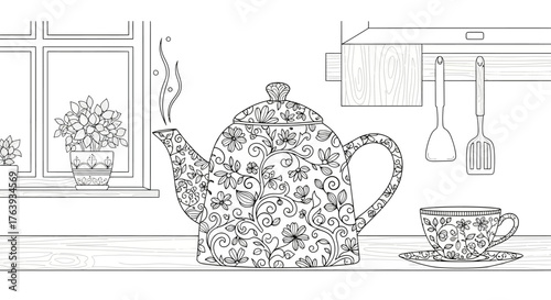 Intricate floral teapot and cup on kitchen counter with window view