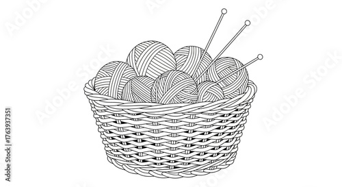 Black and white knitting basket with yarn balls and needles