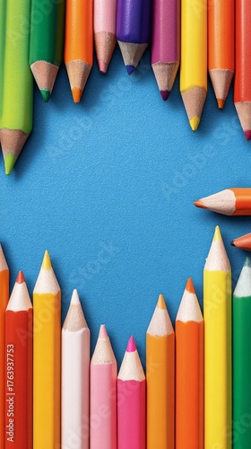 Brightly Colored Crayons Arranged in a Circular Pattern on a White Background