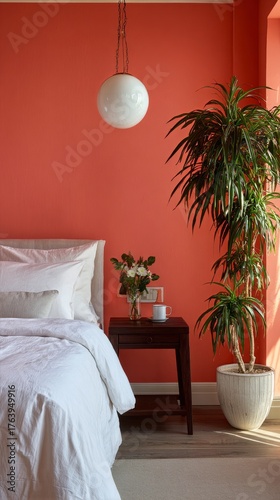 Stylish Bedroom With Coral Walls and Modern Decor in a Cozy Home Setting