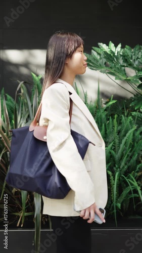 Businesswoman walking in slow motion