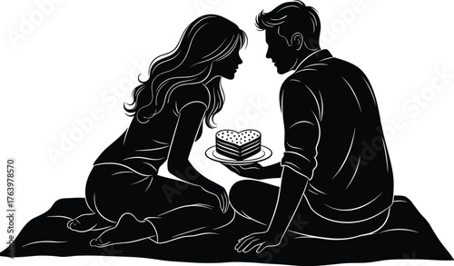Romantic couple shares a slice of cake on a picnic blanket in silhouette