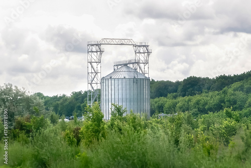 Photography Metal elevator for wheat grain drying in agricultural factory zone