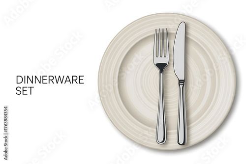 Elegant dinnerware set featuring a plate, fork, and knife, presenting a refined dining experience.