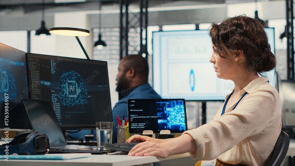 Obraz premium Woman analyst uses AI neural networks for data mining and optimization, working in a multinational company with automation tools. Artificial intelligence digital tools for success. Camera B.