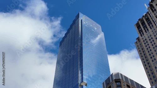 Business skyscraper building. Architecture building business area. Glass skyscraper sky reflection. Sky reflection on business district city. Modern commercial architecture. Modern office building