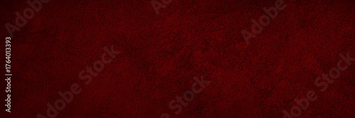 Black dark red texture background. Painted concrete wall surface. Grunge rough uneven plaster scratched damaged. Close-up. Design.Template. Empty blank. Wide banner. Panorama.