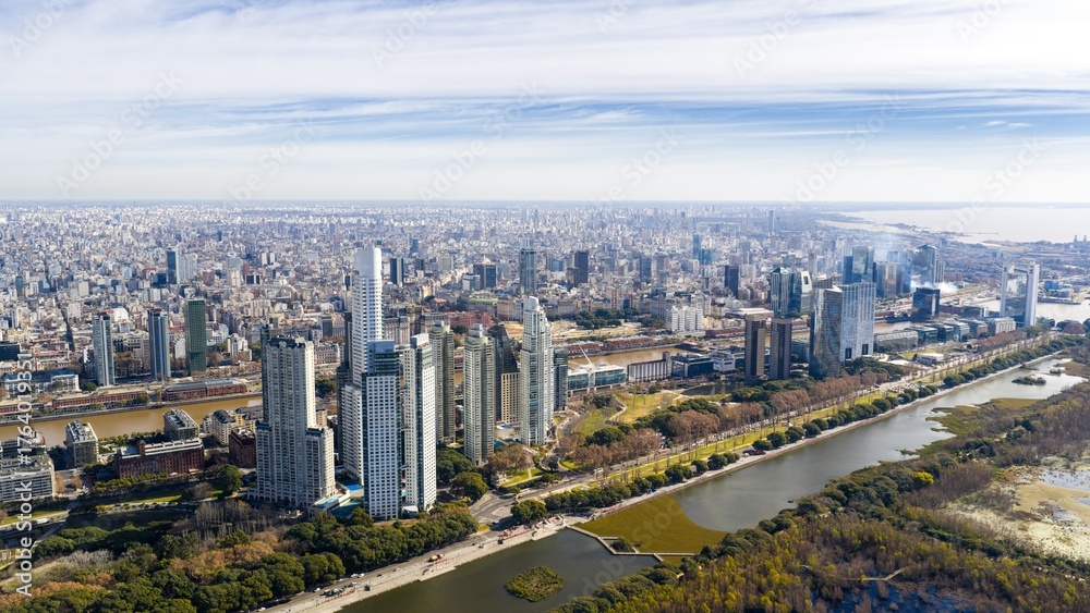 Obraz premium Aerial drone view of the modern skyline of Puerto Madero and surrounding cityscape in Buenos Aires, Argentina.
