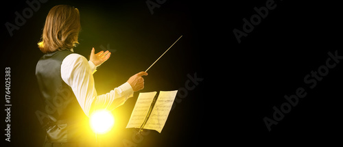 Young male conductor with n...