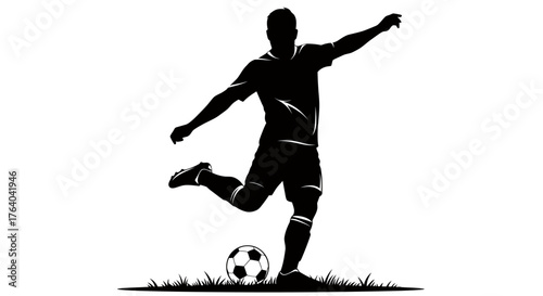 A dynamic black silhouette vector illustration depicts a male football player in action, skillfully kicking a soccer ball on a patch of green grass.