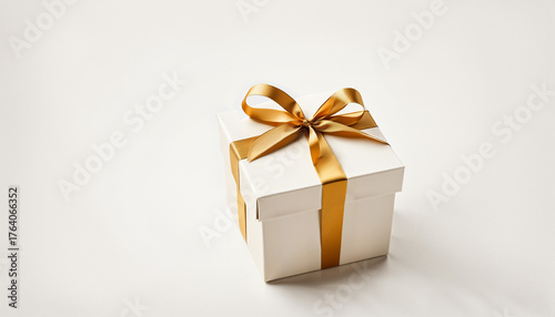 a square white gift box wit...