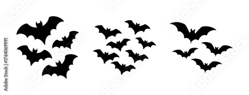 Silhouette bat swarm flying across sky for spooky halloween decorations and themed events