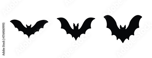 Three silhouettes of flying bats against a white backdrop for spooky or halloween themed designs