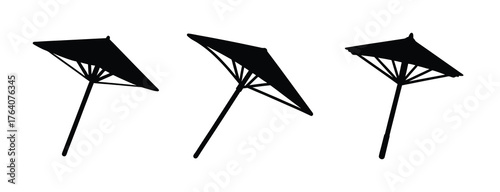 Three stylized black asian umbrellas arranged side by side with simple ribbing detail
