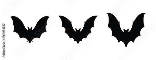 Three silhouettes of flying bats halloween decorations and spooky night scenes