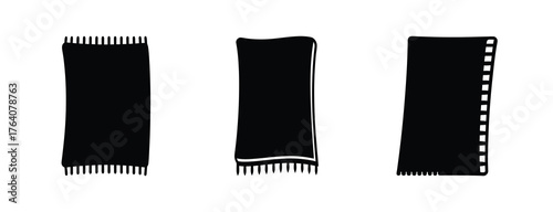 Three simple black rectangles representing towels or blankets with fringed edges isolated on