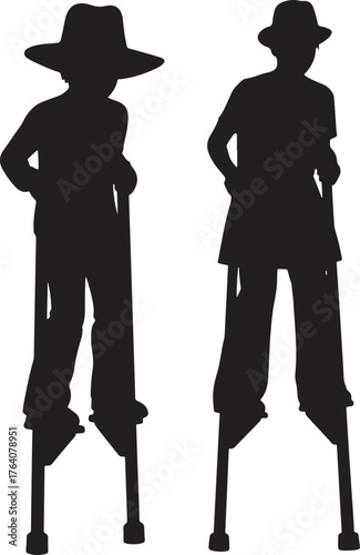 Two children on stilts silhouette
