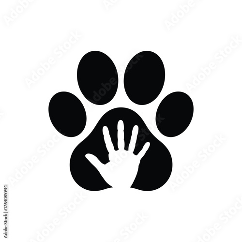 Human hand inside dog paw print silhouette symbol