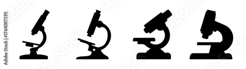 A quartet of silhouette microscopes demonstrating scientific discovery and magnification tools in close up view