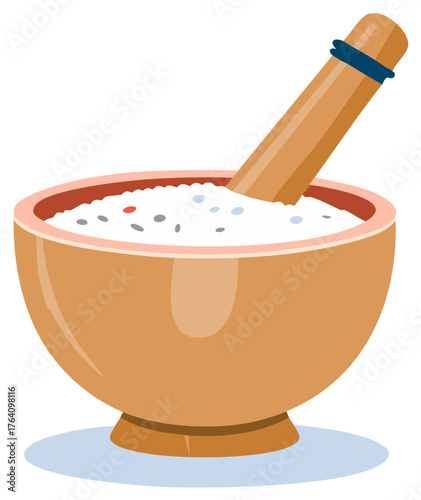 Wooden Mortar and Pestle filled with white salt and peppercorns for grinding
