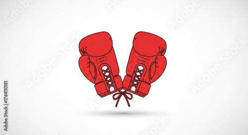 Pair of red boxing gloves, essential gear for combat sports, offering hand protection during training and sparring