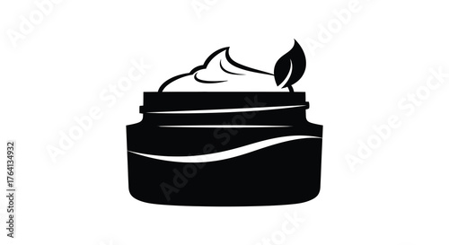 Black silhouette of a glass jar filled with cream and a small green leaf on a white background silhouette