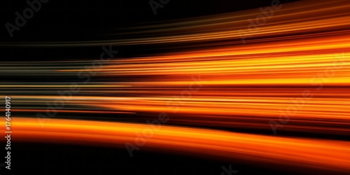 Streaking orange light trails move horizontally across black background.