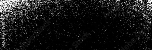 Black wallpaper with white grange particles and speckles pattern. Vector background.