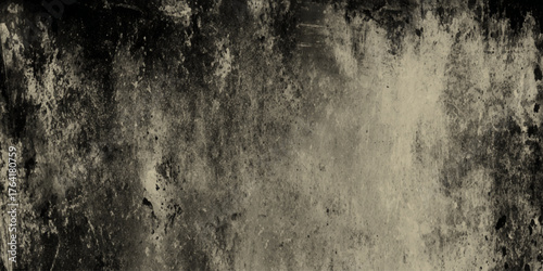 Mysterious dark gray wall texture with industrial concrete tones, artistic grunge detail and warm tone in background.
