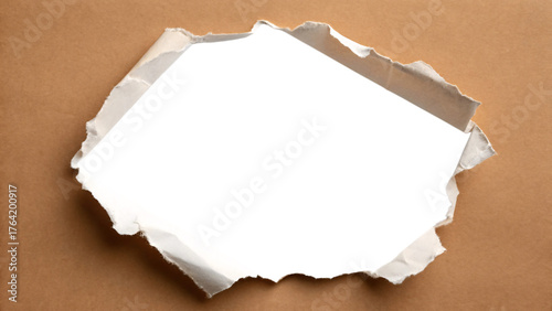 Irregular white torn paper opening through brown kraft paper with rough edges and dimensional curl effect
