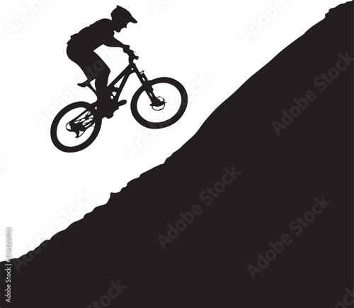 Mountain biker silhouette riding on a mountain adventure