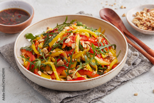 Thai salad with mango and peanut dressing